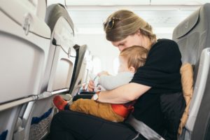 Doctor Mom with Baby on a PlanePhoto by Paul Hanaoka on Unsplash